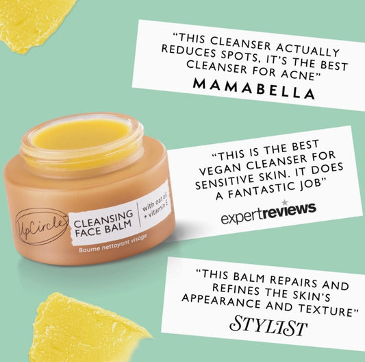 Cleansing face balm jar with positive reviews on a green background